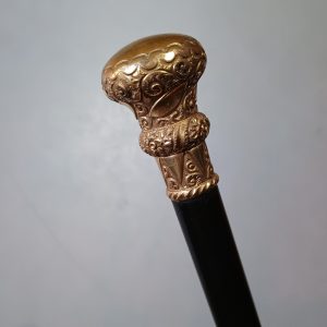 Bastón antiguo manilla bañada en oro